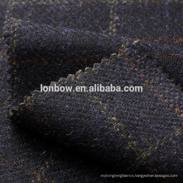 Donegal wool navy tweed overcheck fabric ,material ideal for coats and suits.